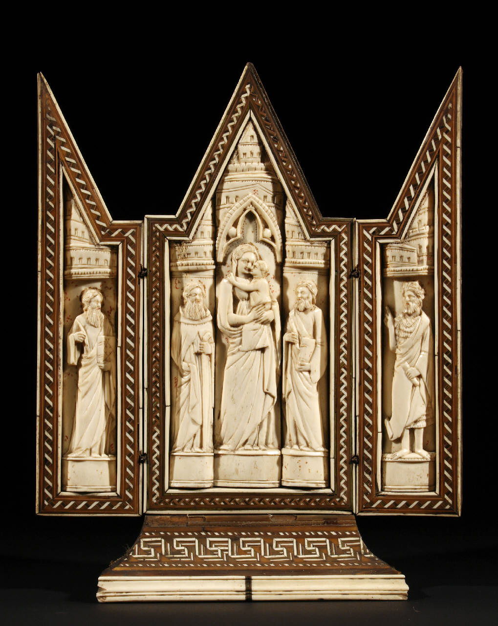 Madonna con bambino, san Giovanni Battista, figure di santi (trittico) di bottega degli Embriachi - bottega dell'Italia settentrionale (prima metà sec. XV)