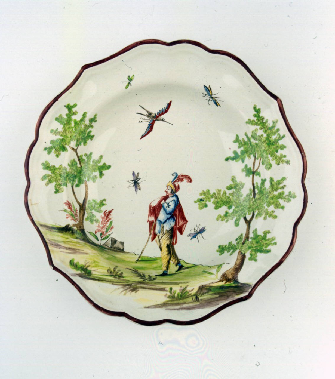 Figura maschile di profilo tra due alberi (piatto fondo) di Manifattura Felice e Giuseppe Maria Clerici (sec. XVIII)