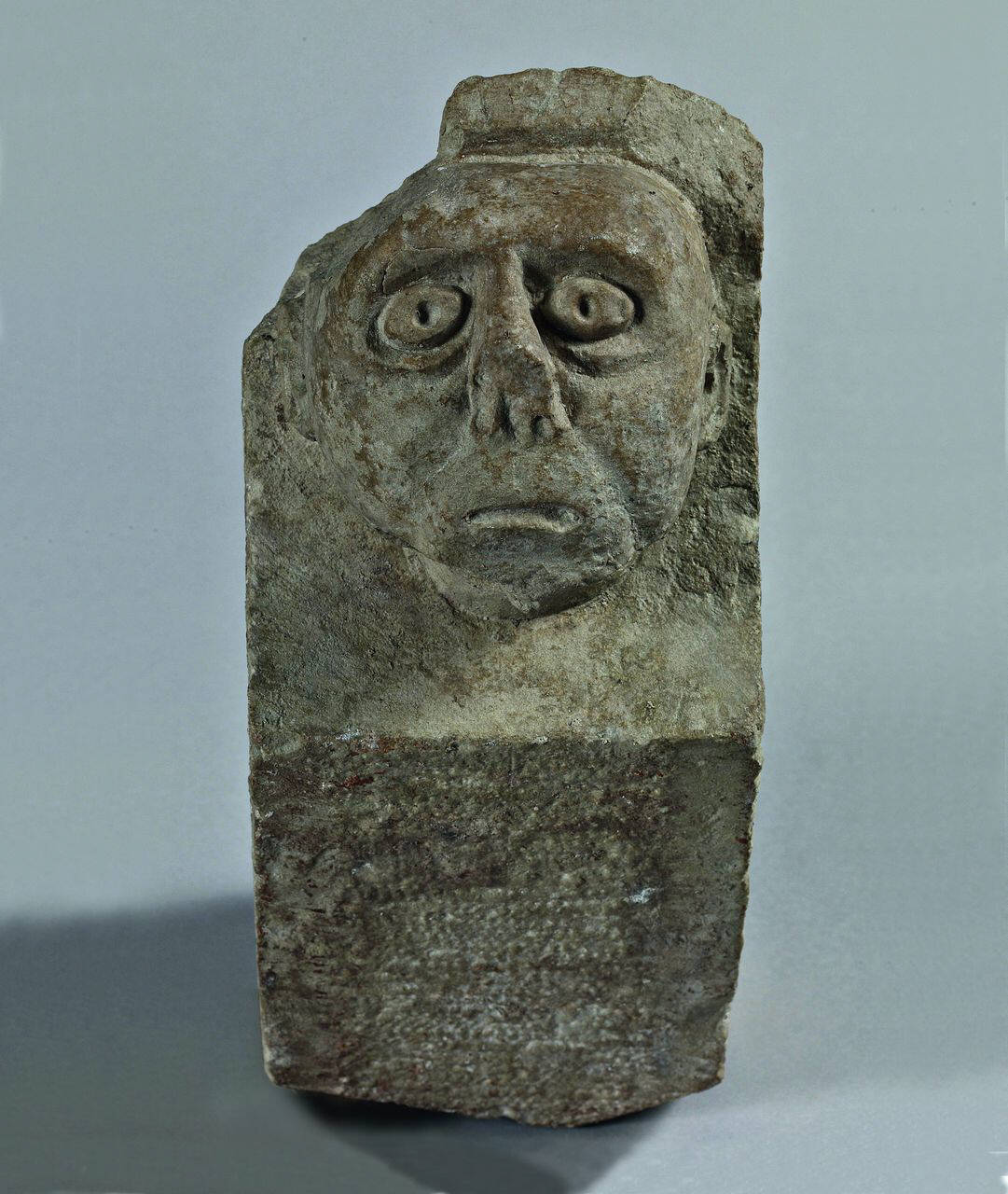 mensola con testa umana (mensola) di Scultore - ambito lombardo (sec. XIII)