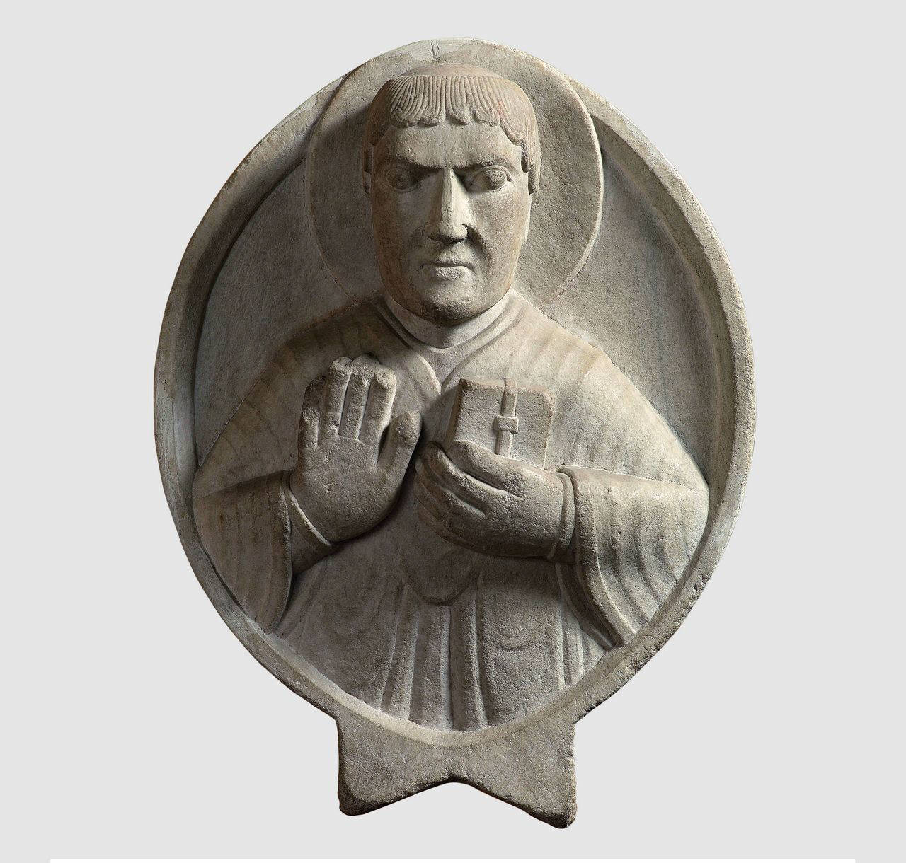 San Silmpliciano entro clipeo (lastra ovale, altorilievo) di Scultore; Maestro della Madonna degli Osii - ambito campionese (fine/ inizio sec. XII)