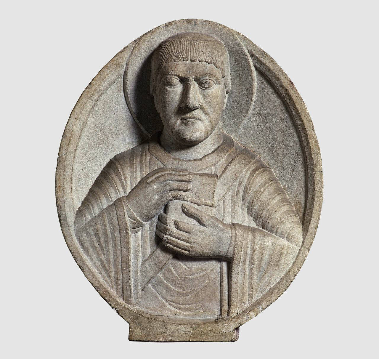 San Sisinnio entro clipeo (lastra ovale, altorilievo) di Scultore; Maestro della Madonna degli Osii - ambito campionese (sec. XIV)