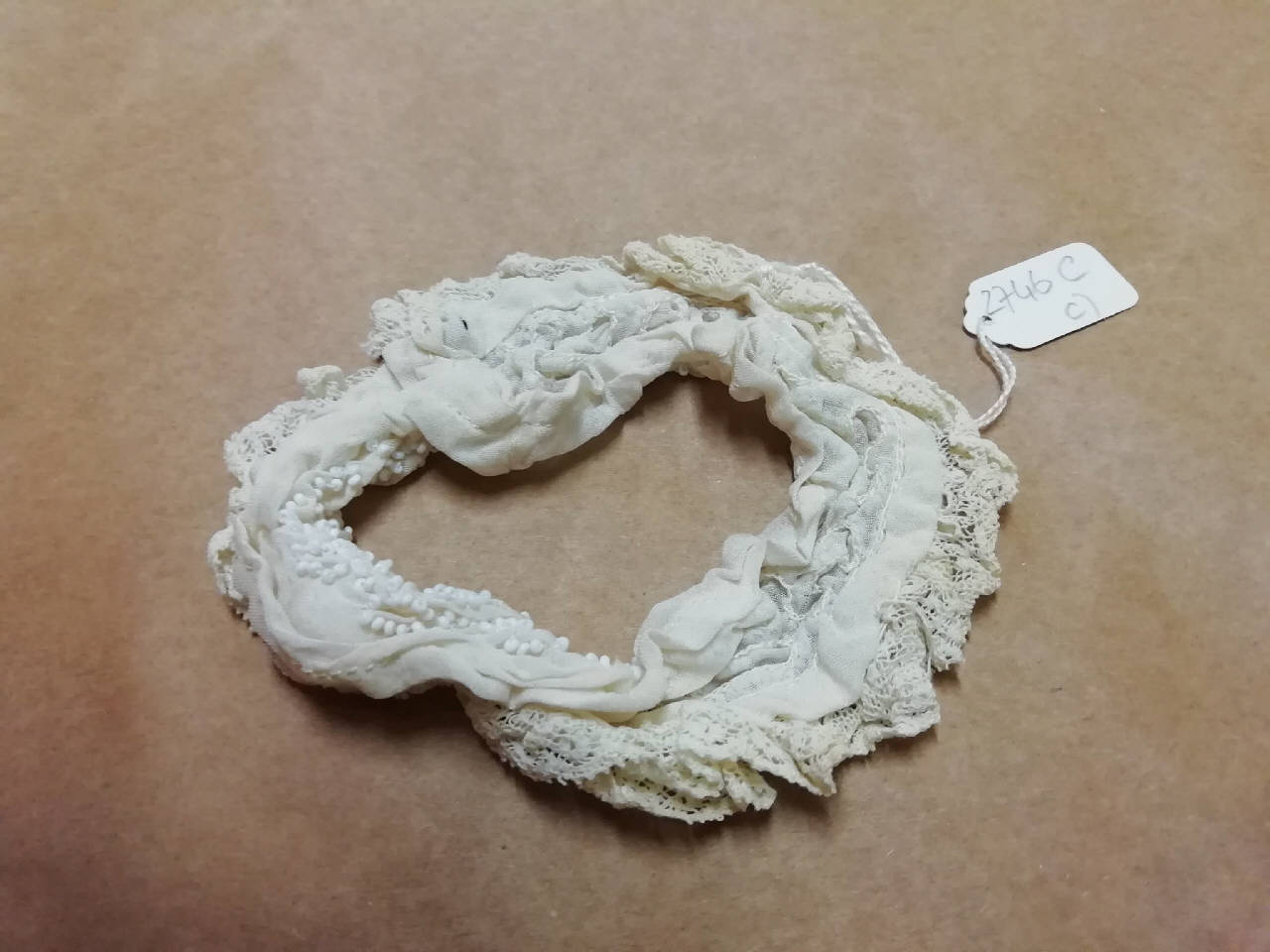 polsino (?) - manifattura italiana (inizio sec. XX)