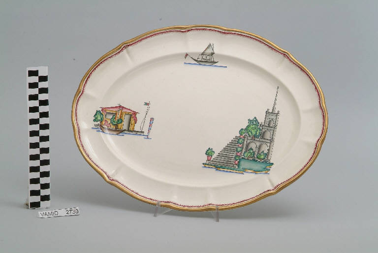 Veduta del ninfeo nel giardino Borromeo nell'Isola Bella ed elementi caratteristici del Lago Maggiore (piatto da portata ovale) di Andlovitz Guido; Società Ceramica Italiana Laveno (sec. XX)