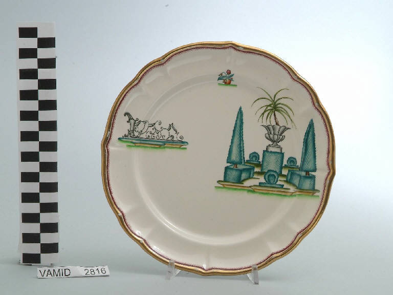 Veduta di un giardino all'italiana ed elementi caratteristici del Lago Maggiore (piatto da frutta) di Andlovitz Guido; Società Ceramica Italiana Laveno (sec. XX)