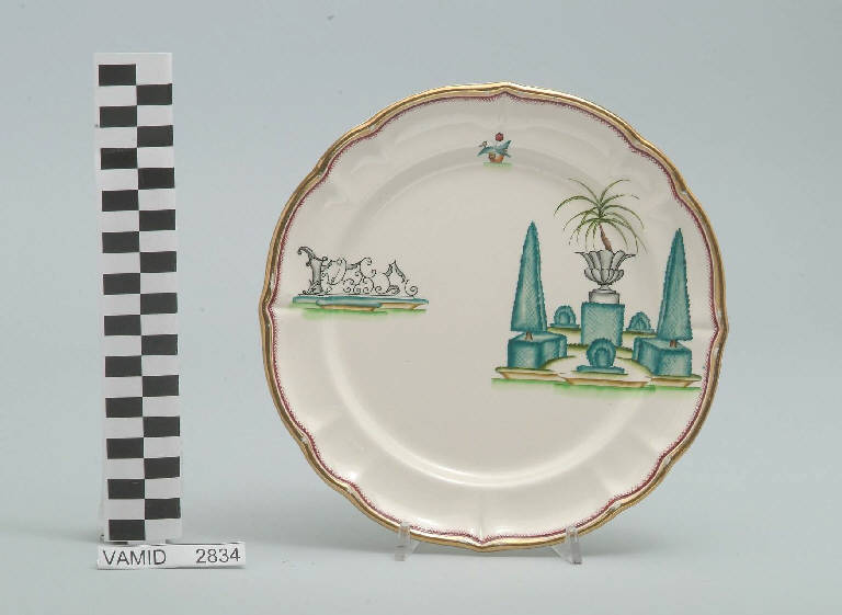 Veduta di un giardino all'italiana ed elementi caratteristici del Lago Maggiore (piatto da frutta) di Andlovitz Guido; Società Ceramica Italiana Laveno (sec. XX)