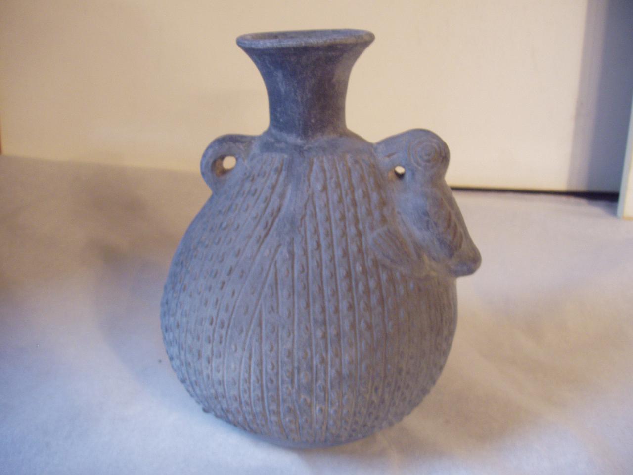 Bottiglia con decorazione zoomorfa, pappagallo (bottiglia) - produzione Chimù/Inca (fine/inizio secc. XV/ XVI)