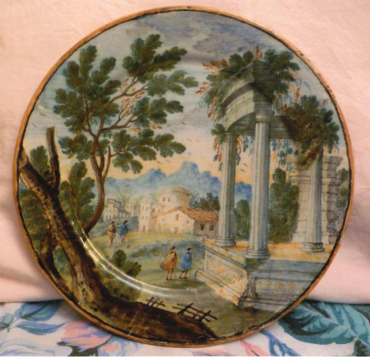 Piattino con paesaggio e figure (piattino) di Cappelletti, Nicola - manifattura di Castelli (sec. XVIII)