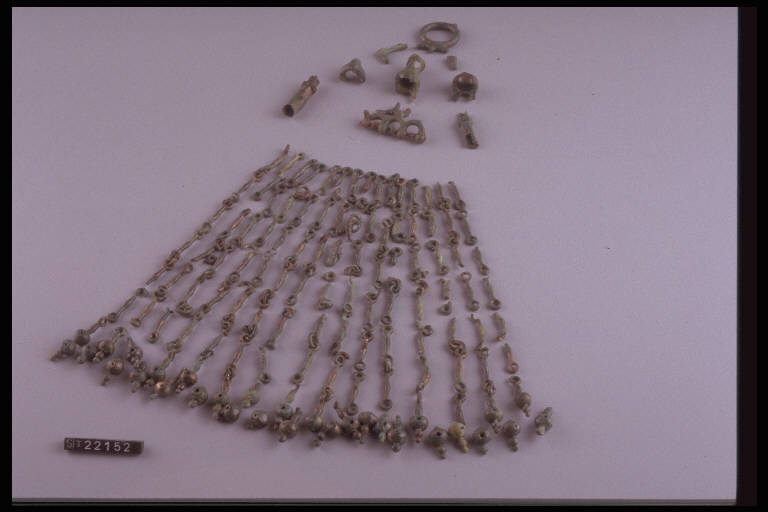 pendaglio, tipo Trezzo - cultura di Golasecca (fine/inizio secc. VI/ V a.C.)